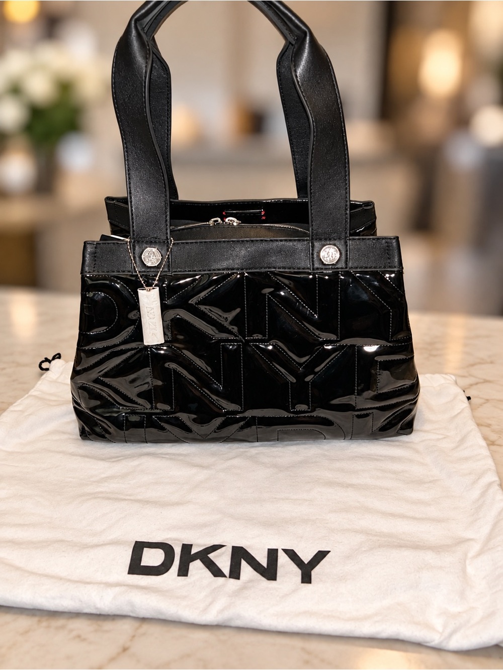 DKNY patent leather satchel